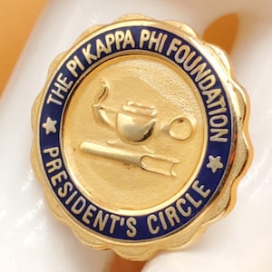vintage gold tone enamel The Kappa Phi Foundation President's Circle lapel pin