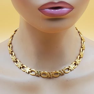 vintage Avon gold tone star and O link chain necklace