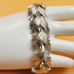 Pulsera vintage MCM Lisner de eslabones con forma de hoja en tono plateado