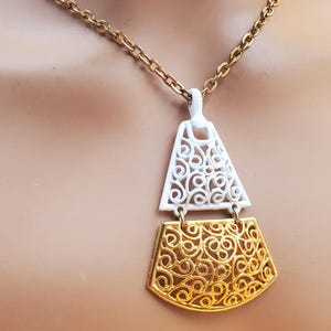 vintage MCM gold and white enamel open scrollwork panel pendant necklace
