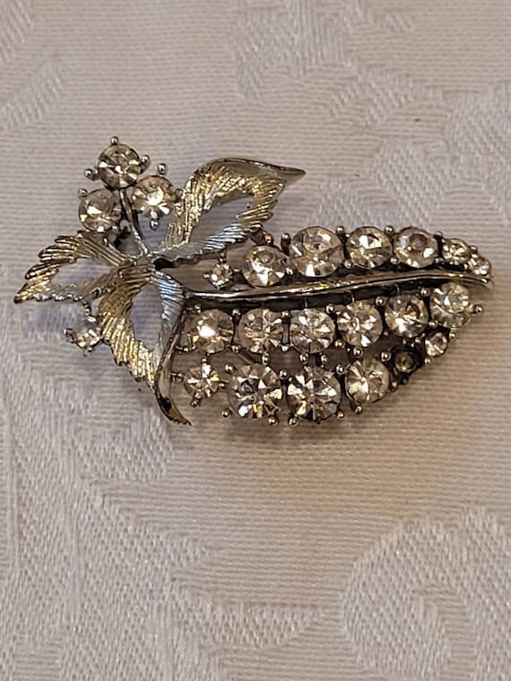 Vintage Lisner clear rhinestone leaf brooch