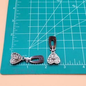 Vintage Brighton silver tone hearts earrings with dangling brown faux shell open panels image 7