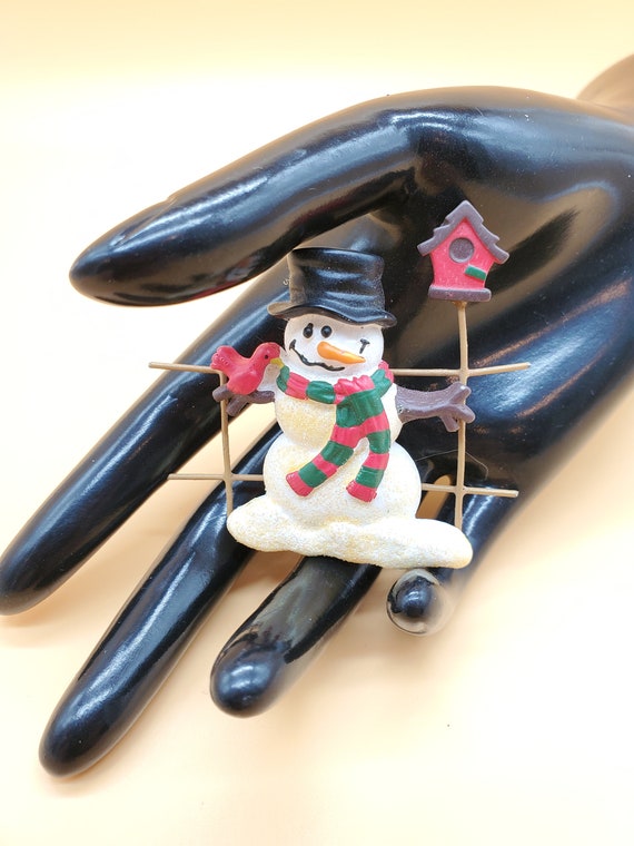 Vintage holiday snowman brooch with cardinal and b