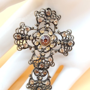 Vintage brown yellow rhinestone cross brooch