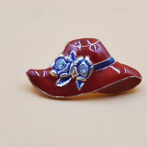 vintage red and purple enamel Red Hat Society hat brooch with rhinestone accents