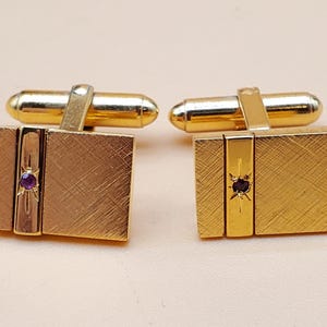 Vintage Christian Dior gold plated cufflinks with small Ruby accents