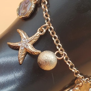 vintage beach seashell themed charm bracelet