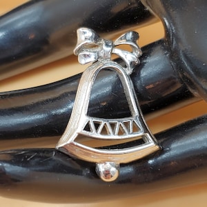 Vintage Avon silver tone Christmas Silver Bell pin
