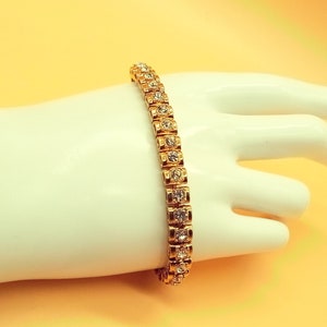 Vintage Avon gold plated clear crystal tennis bracelet