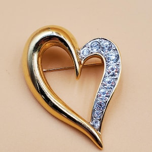 vintage gold tone heart brooch with clear rhinestones