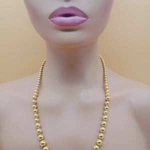 Vintage Napier gold tone graduated bead ball necklace