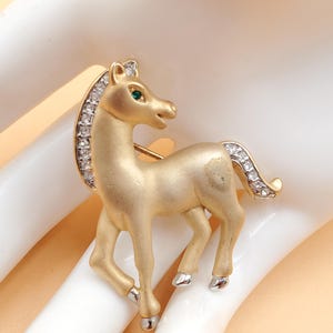 vintage gold tone rhinestone horse pin brooch