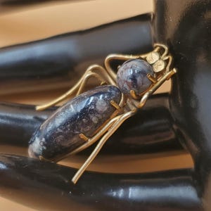 Vintage dark stone beetle pin brooch