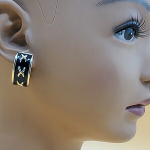 Vintage Landau black enamel gold tone stitch half hoop clip on earrings