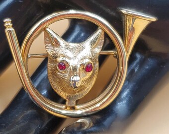 Vintage gold-plated fox in horn pin