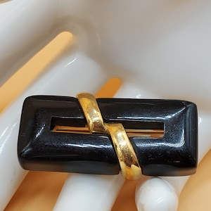 Vintage Crown Trifari black lucite gold tone rectangle brooch