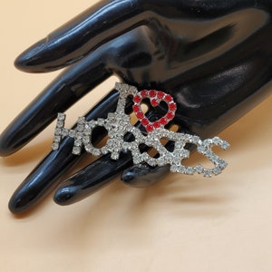 Broche vintage con forma de caballo y diamantes de imitación transparentes y rojos