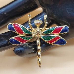 vintage enamel dragonfly brooch with rhinestone eyes