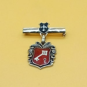 Vintage silver tone Heraldic shield bar brooch with dangling enamel charm