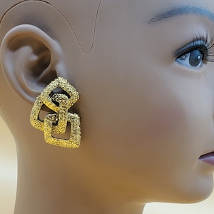 Vintage Coraline geometric runway clip on earrings
