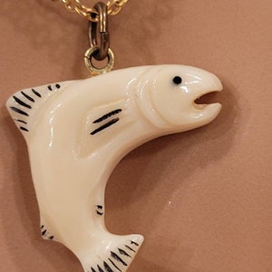 Vintage hand carved fish pendant on gold plated chain