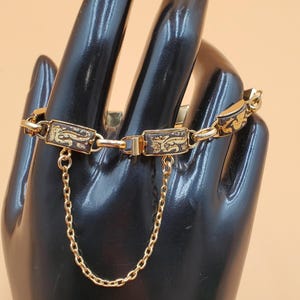 Pulsera vintage de eslabones damasquinados en tono dorado delicado