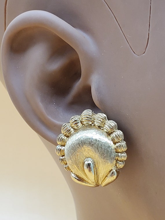 vintage MCM Monet textured gold tone textured clip-on earrings