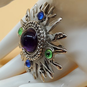 vintage artistic sun burst brooch with rhinestone cabochons
