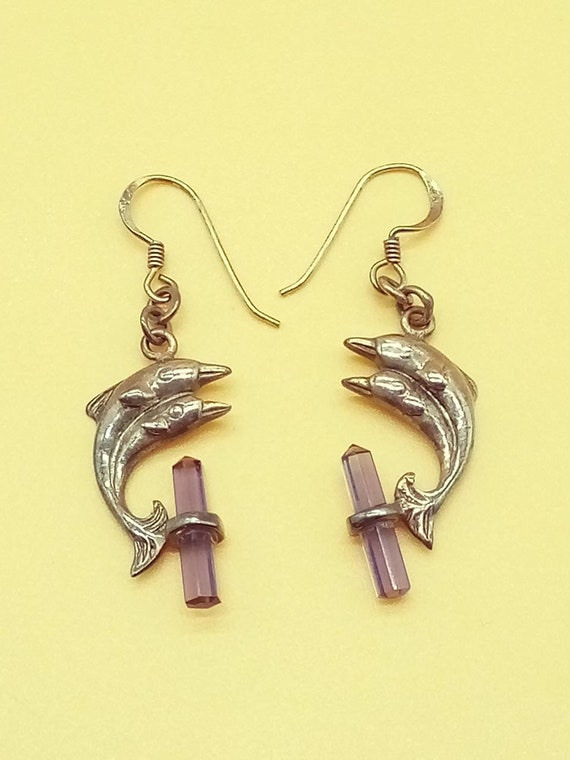 Sterling silver Dancing Dolphins with purple cryst