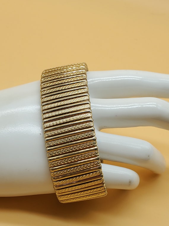vintage wide gold tone stretch bracelet