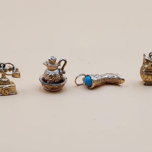 Dije vintage de tono dorado de Avon, estilos seleccionados