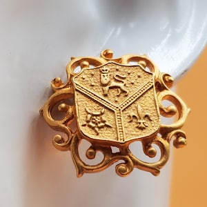 vintage Matte gold tone crest shield pierced earrings