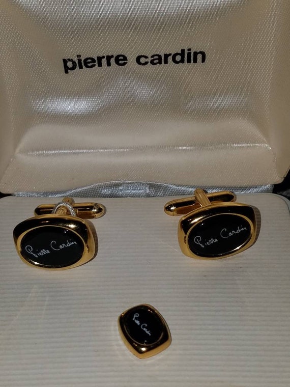 Boutons de manchette Cartier en or jaune, acier et onyx