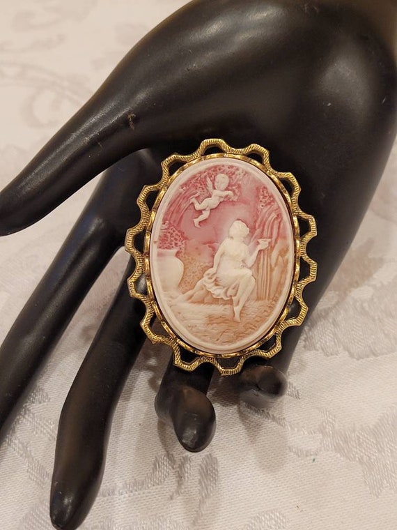 Vintage Coro resin cherub cameo brooch