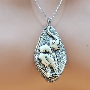 Vintage white elephant pendant necklace