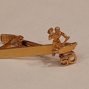Vintage Ironworker gold tone tie clip
