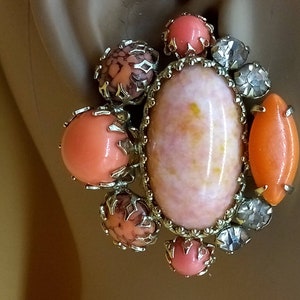 Vintage signed SCHREINER EARRINGS, peachy orangey rhinestone accented large clip on earrings