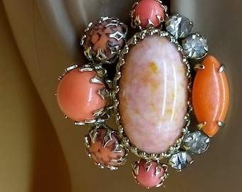 Vintage signed SCHREINER EARRINGS, peachy orangey rhinestone accented large clip on earrings