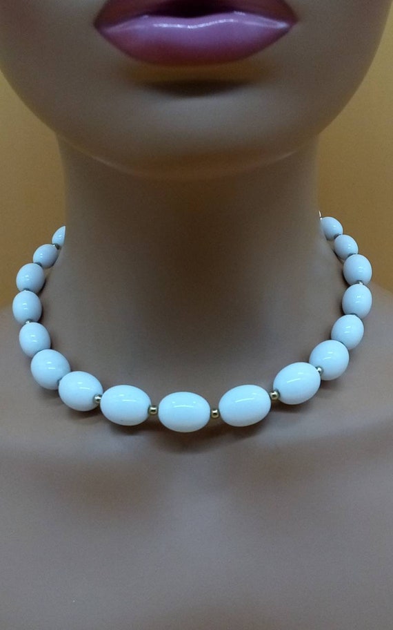 Vintage Monet white plastic beaded necklace with t