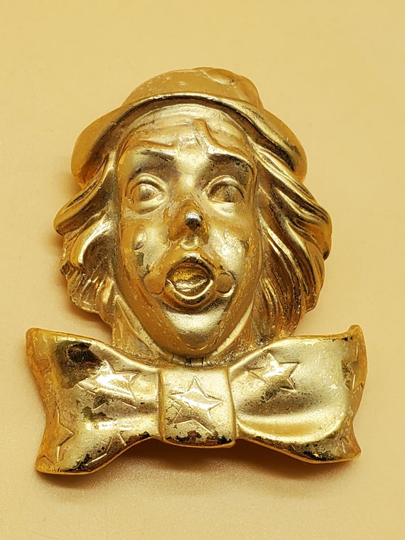 vintage gold tone clown face brooch