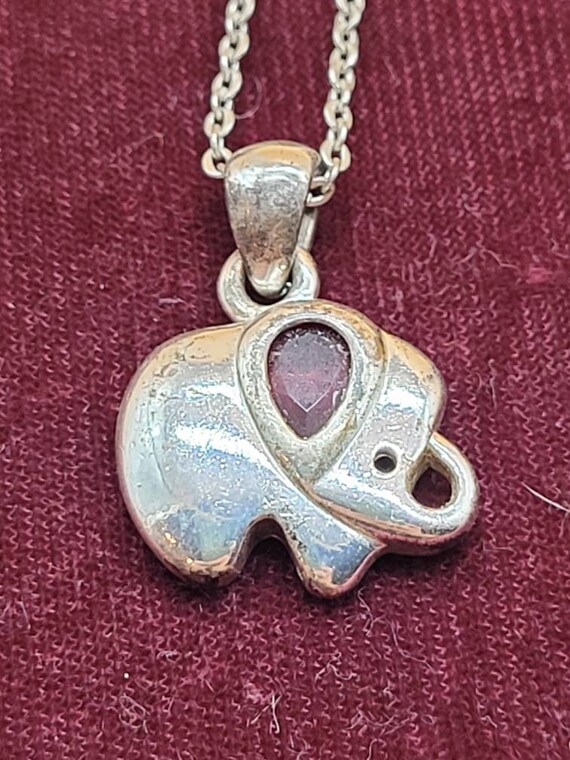 Avon elephant necklace clearance