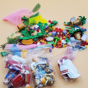 vintage Playmobil pieces,  parts, plants, figures, and misc lot