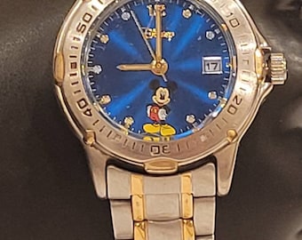 Vintage Disney Mickey Mouse time and date battery operated watch, Works