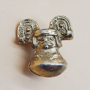 Vintage gold tone Aztec Mayan tribal pin