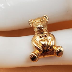 Vintage tiny gold tone teddy bear pin