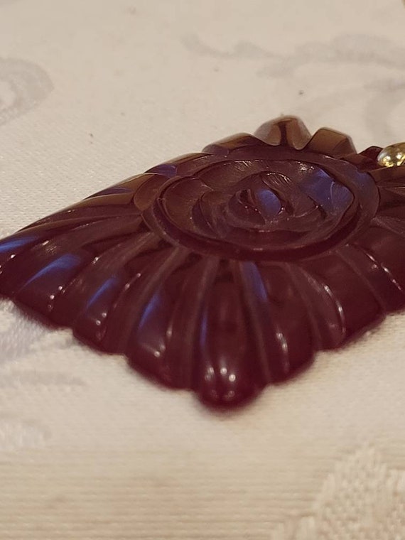 Vintage red carved Bakelite flower pendant - image 6