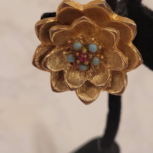 Vintage Polcini gold tone flower earrings with faux turquoise