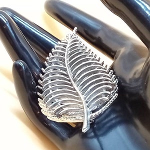 Vintage signed S.H.P. Inc 3D silver tone leaf brooch