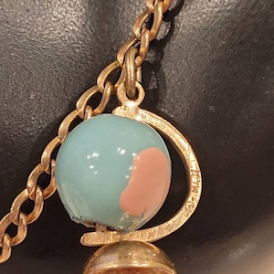 Vintage 10k yellow gold charm bracelet with 4 charms