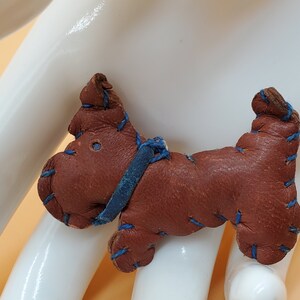 Vintage handmade leather Scottie dog brooch